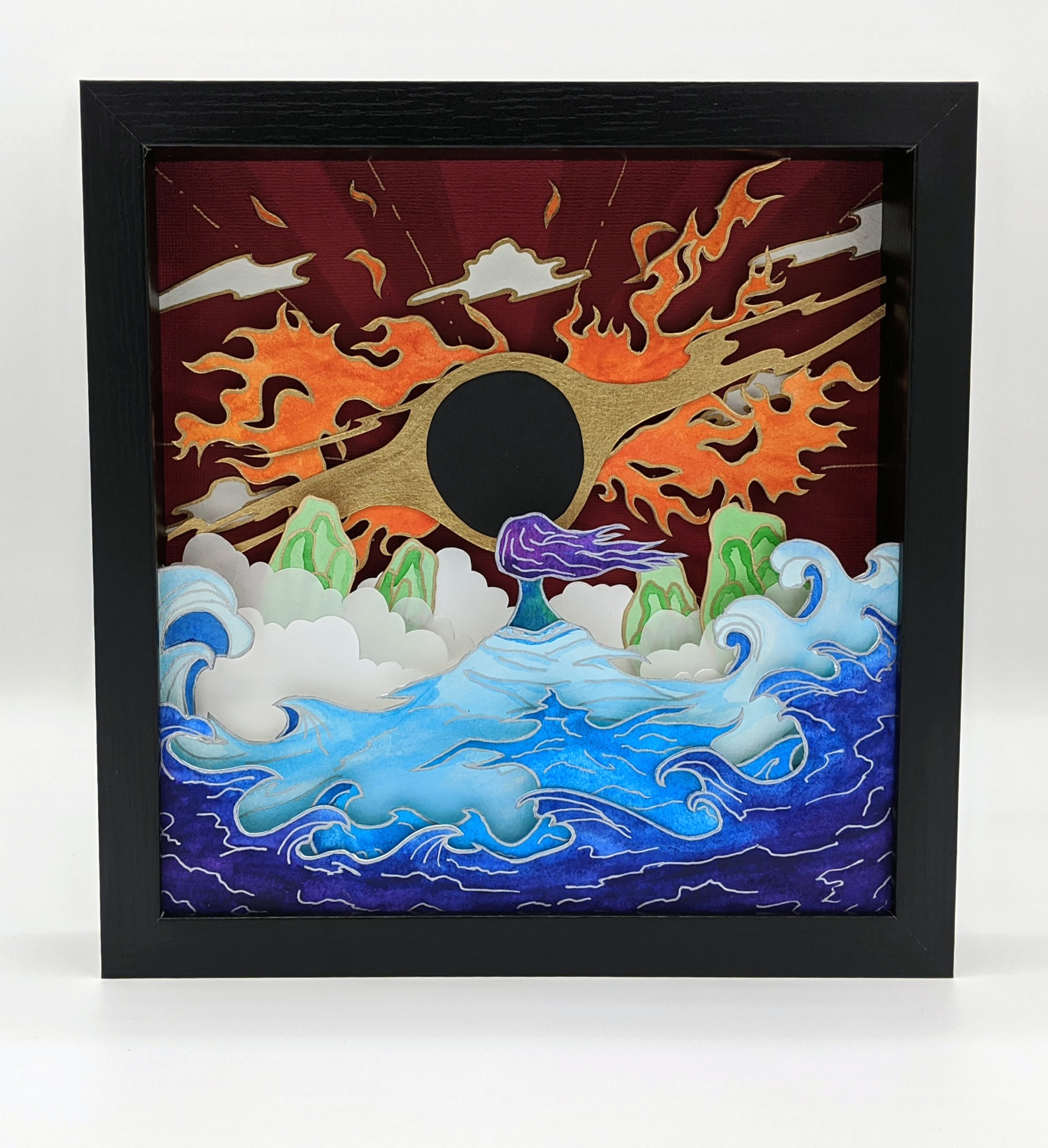 Paper Art of a woman of the sea confronting a flaming fire.
